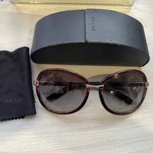 Prada Sunglasses for women in Burgundy